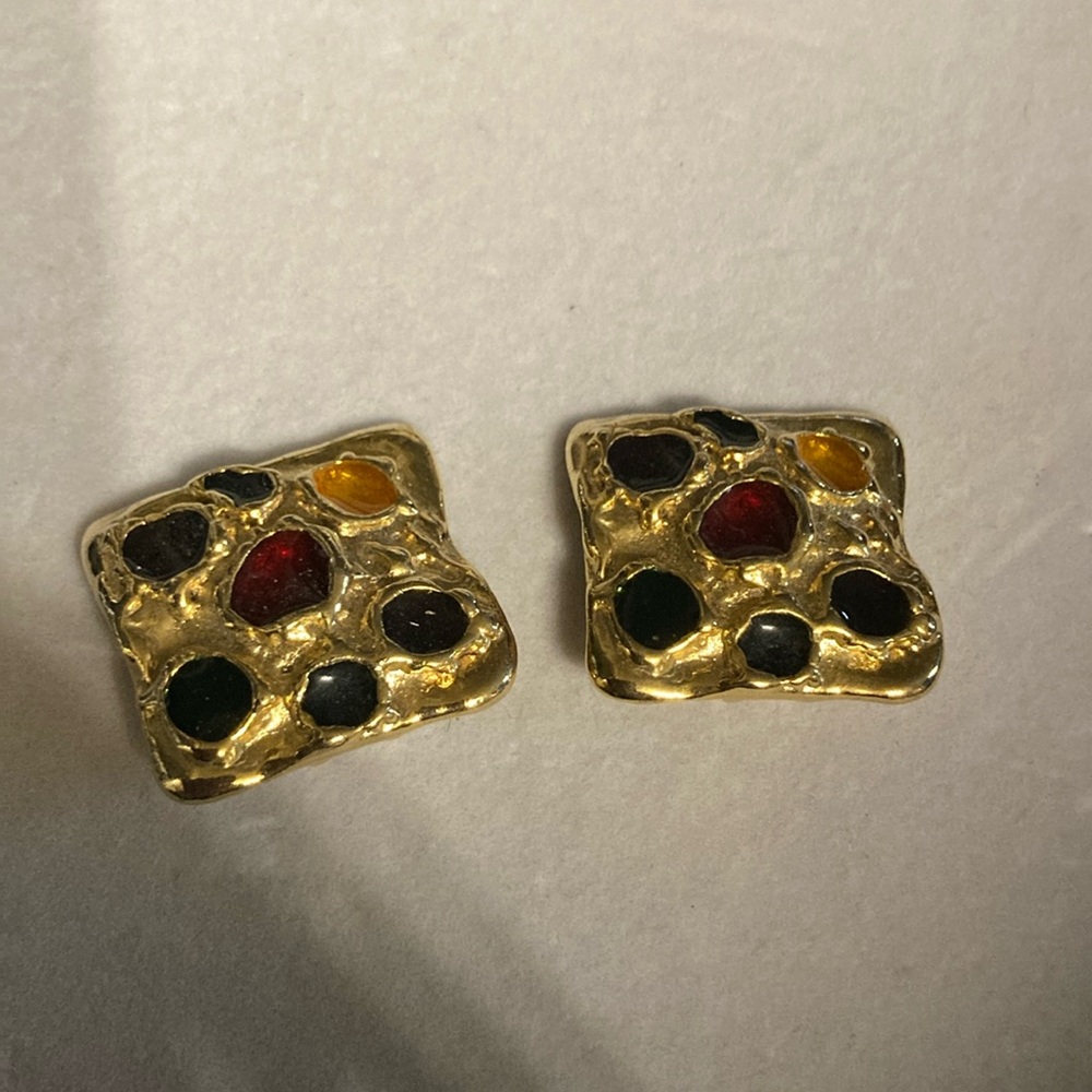 Vintage Bluette gold tone clip earrings made in France . Colored embedded